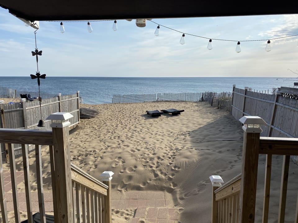 Step onto the sand from your private beach bungalow