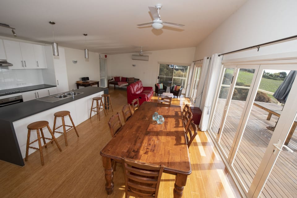 Open the cafe doors to feel the sea breeze - or see that day bed in the corner!