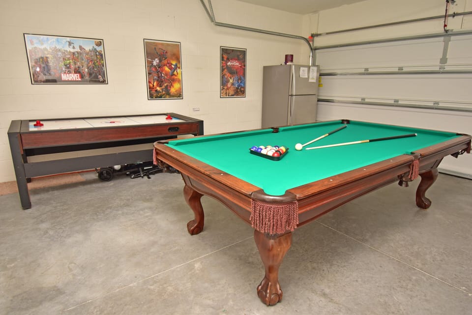Games room showing pool table and air hockey table.