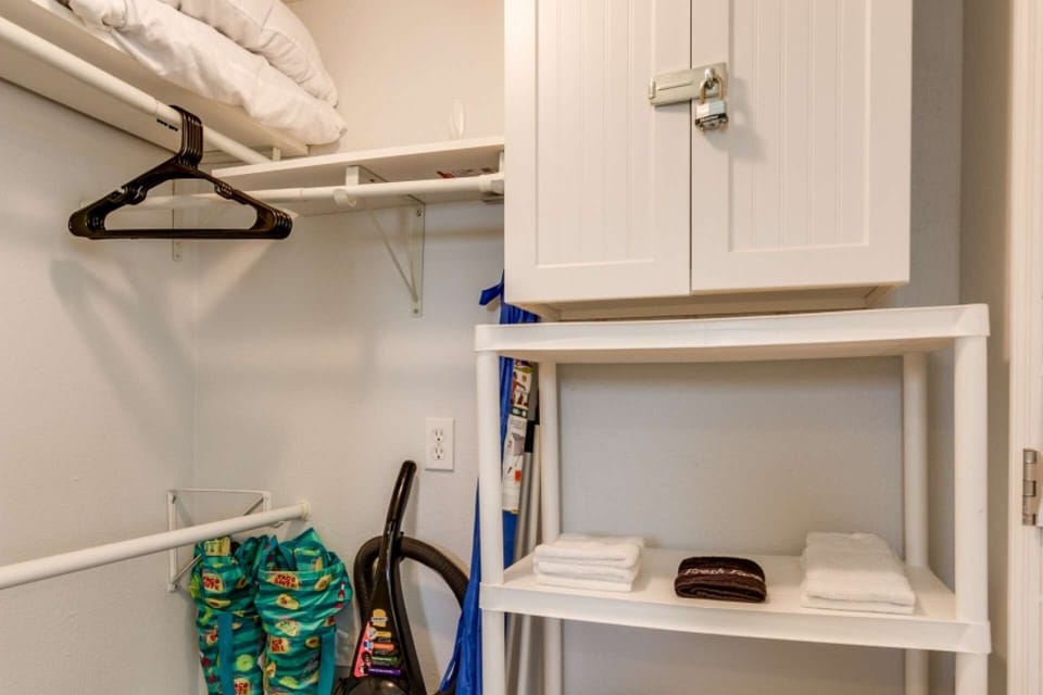 Beach Gear, Vacuum and extra towels in the closet