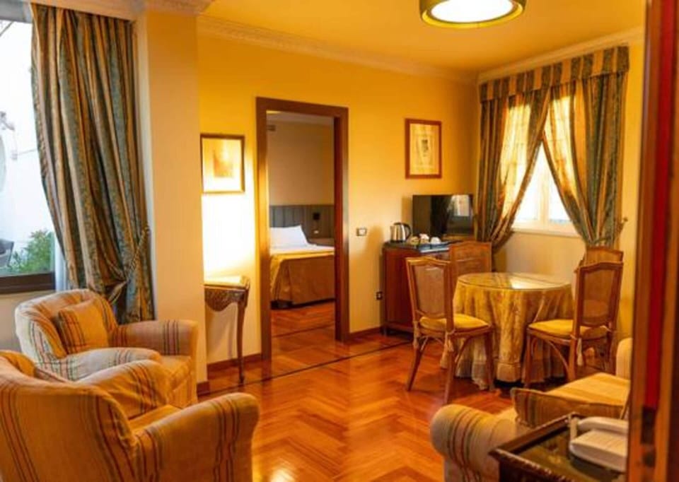 Romantic Suite, Terrace | Living area | Flat-screen TV