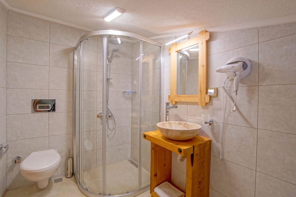 Deluxe Double Room, Sea View, Garden Area | Bathroom | Shower, hydromassage showerhead, hair dryer, slippers