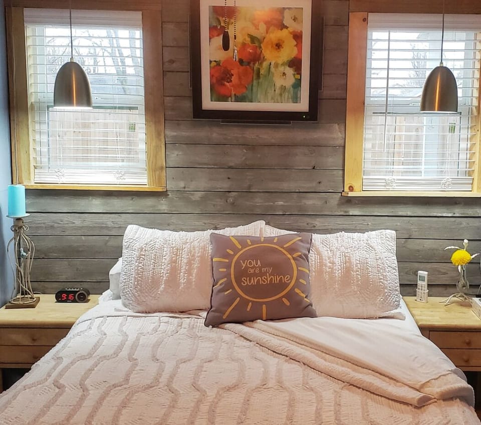 Relax in this comfortable queen size bed after a day of exploring 