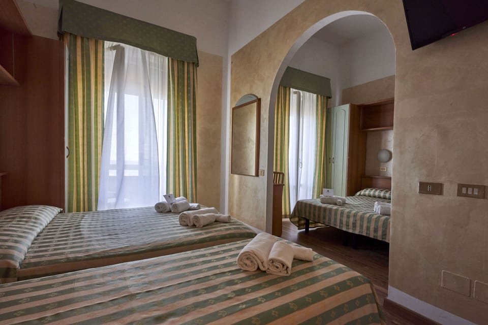 Family Room | In-room safe, individually decorated, individually furnished, desk