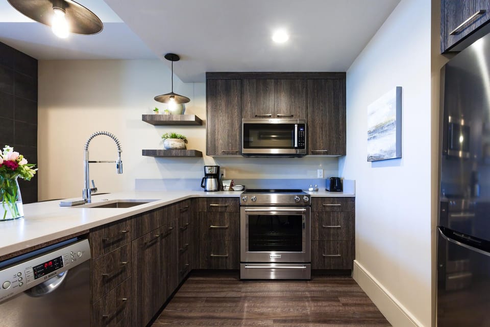 Cook in style in this fully equipped chef's kitchen, featuring stainless steel appliances. The perfect space to prepare meals before exploring the local Park City area.