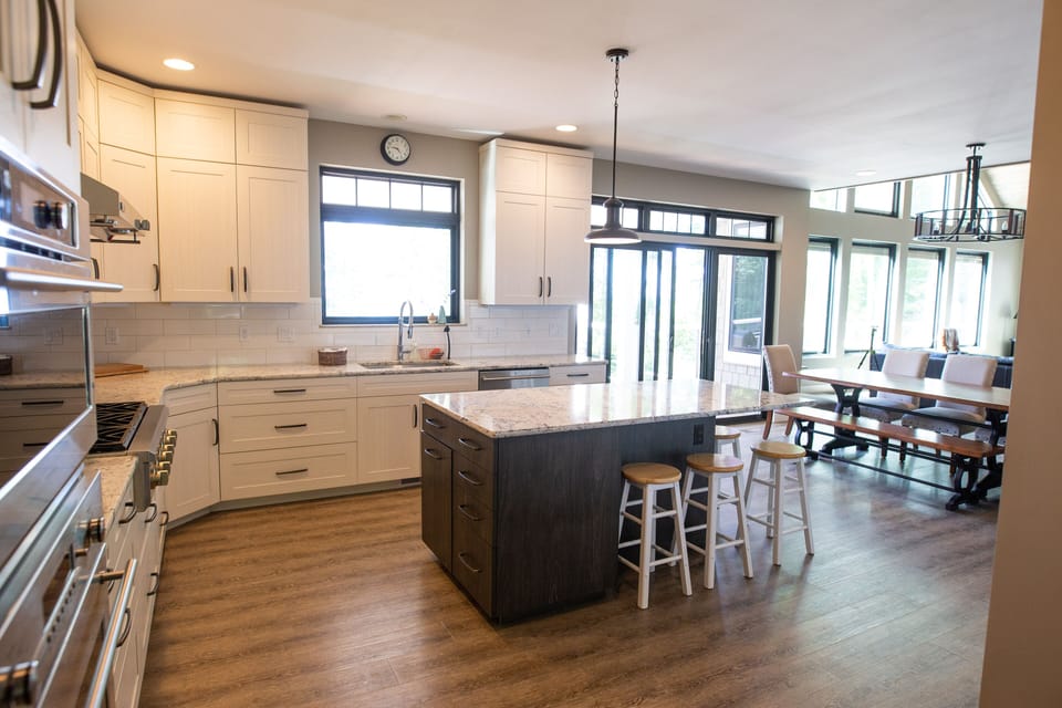 Island, doors to deck with gas grill
