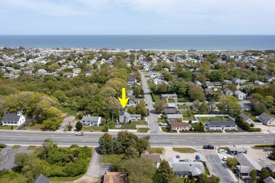 street view of home shows straight street walk to beach