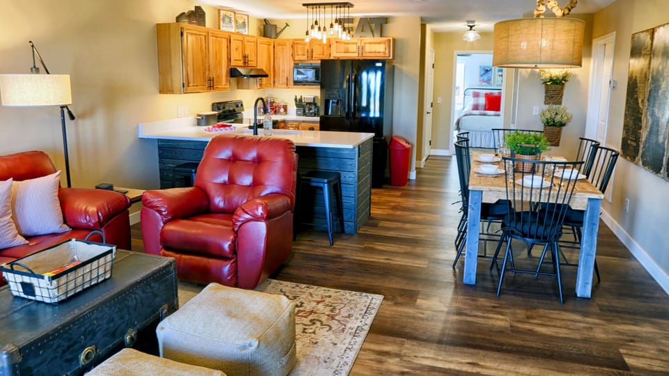 Open concept living room, dining area, and full-sized kitchen