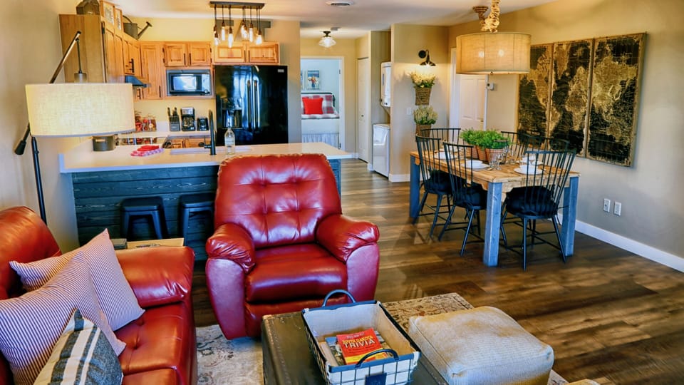 Open concept living room, dining area, and full-sized kitchen 