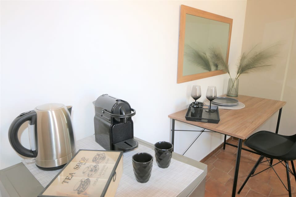 Double Room, Garden View | In-room safe, iron/ironing board, free WiFi, bed sheets
