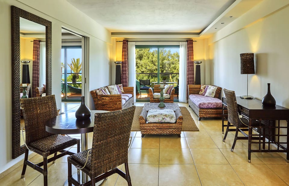 Honeymoon Suite, Sea View | Living room | TV