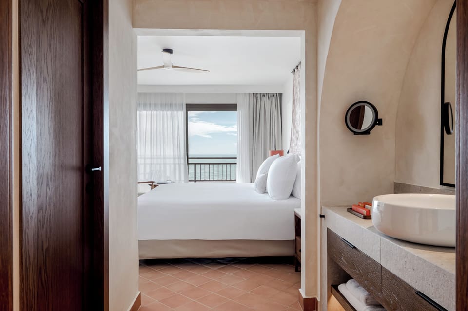 Exclusive Adult Sea View Suite with Premium Perks (Aged 16+ | Renovated) | Minibar, in-room safe, blackout drapes, iron/ironing board (on request)
