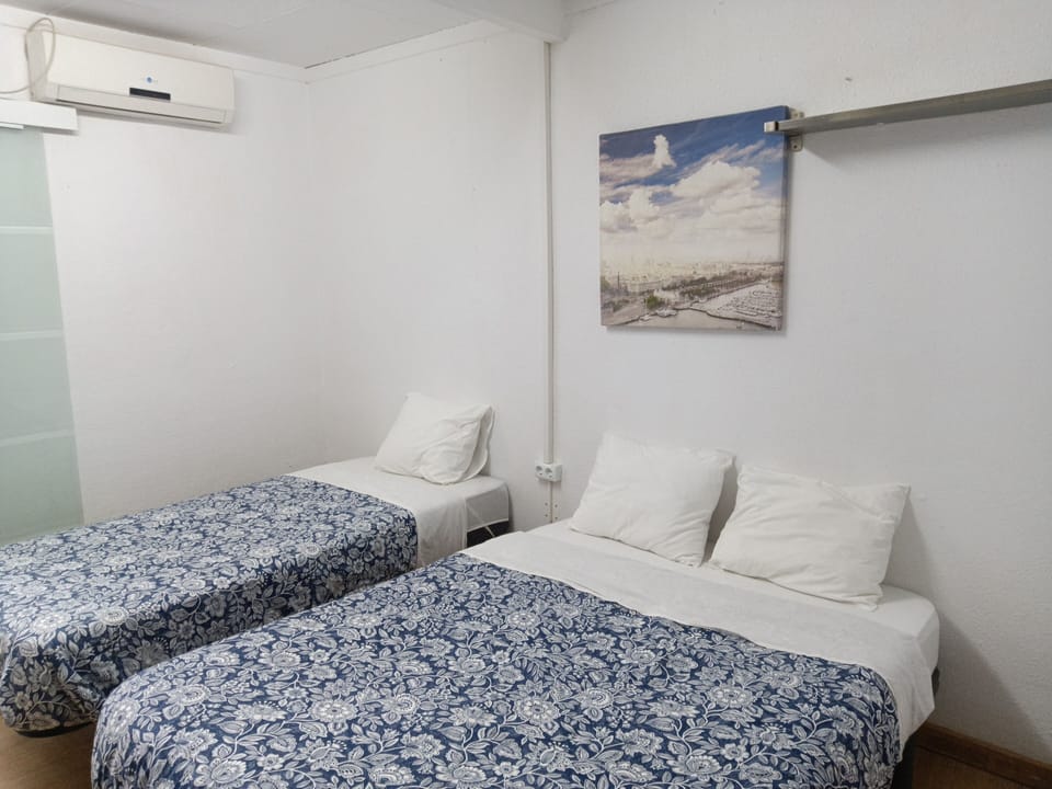 Family Triple Room, Multiple Beds, Garden View | Desk, WiFi (free), bed sheets