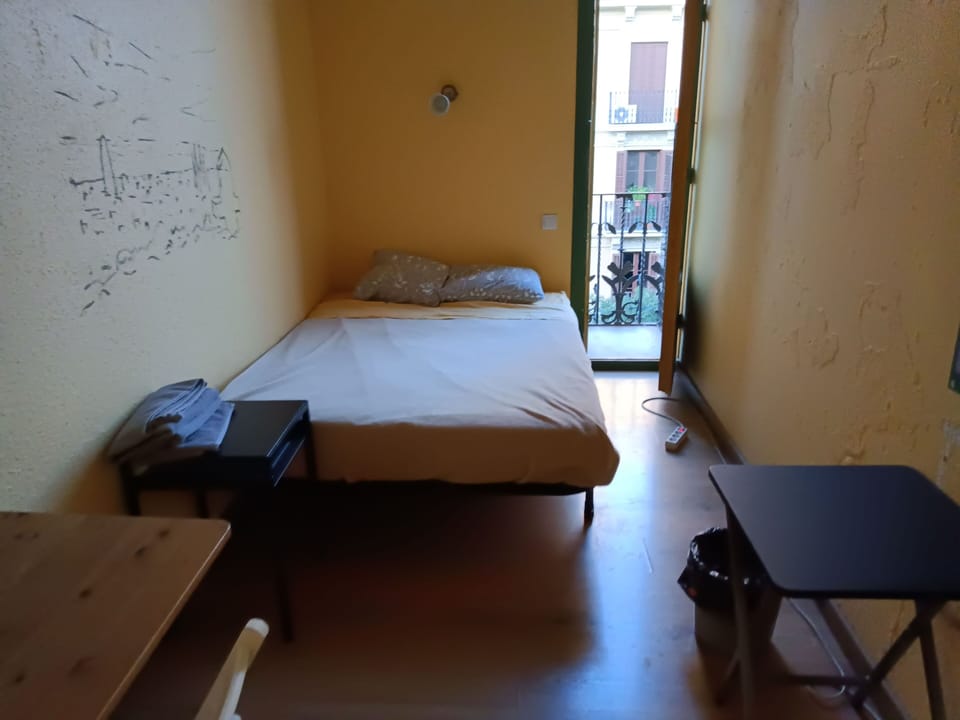 Economy Double Room, Shared Bathroom | Desk, WiFi (free), bed sheets