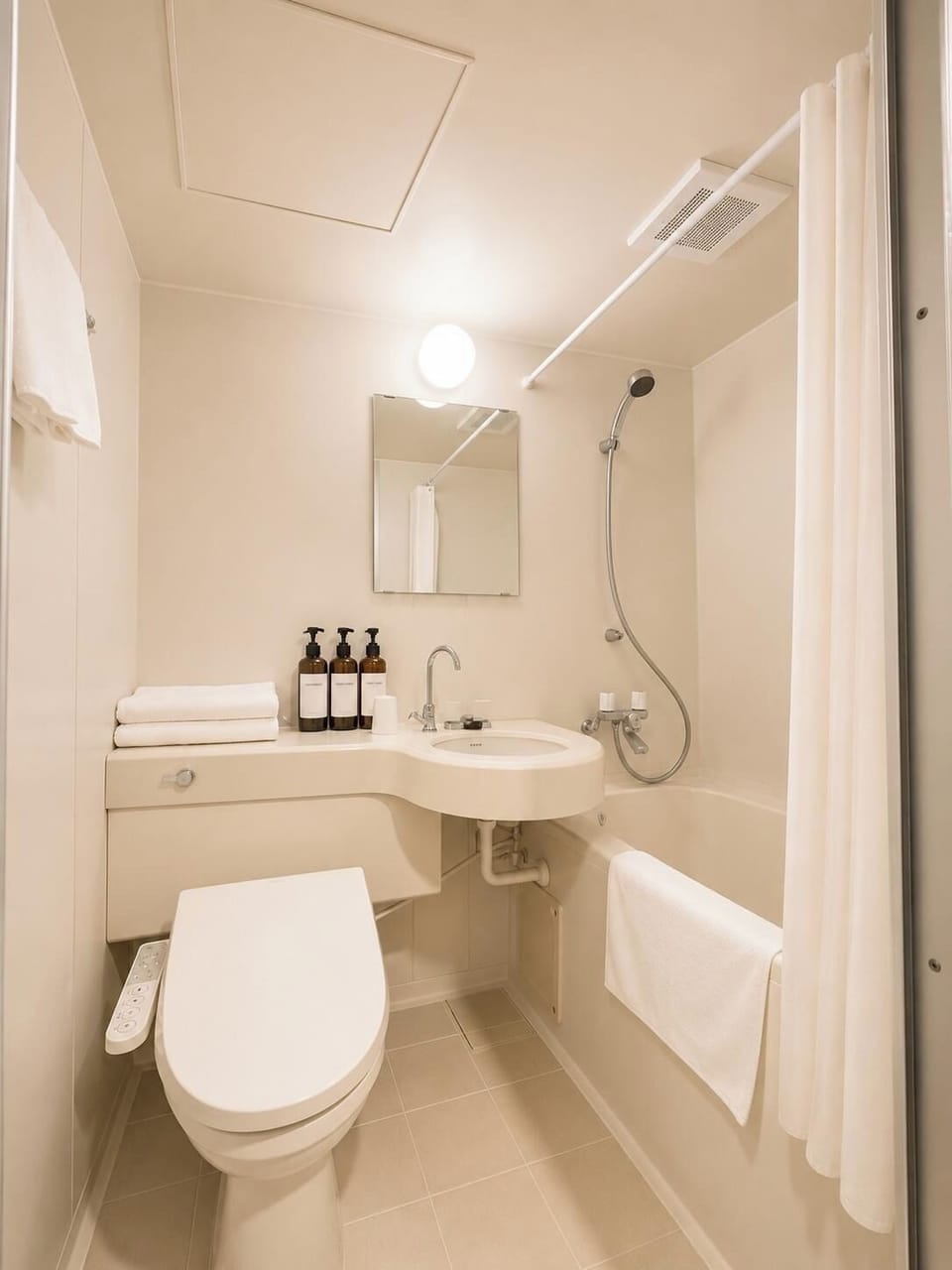 Combined shower/tub, hair dryer, bathrobes, slippers