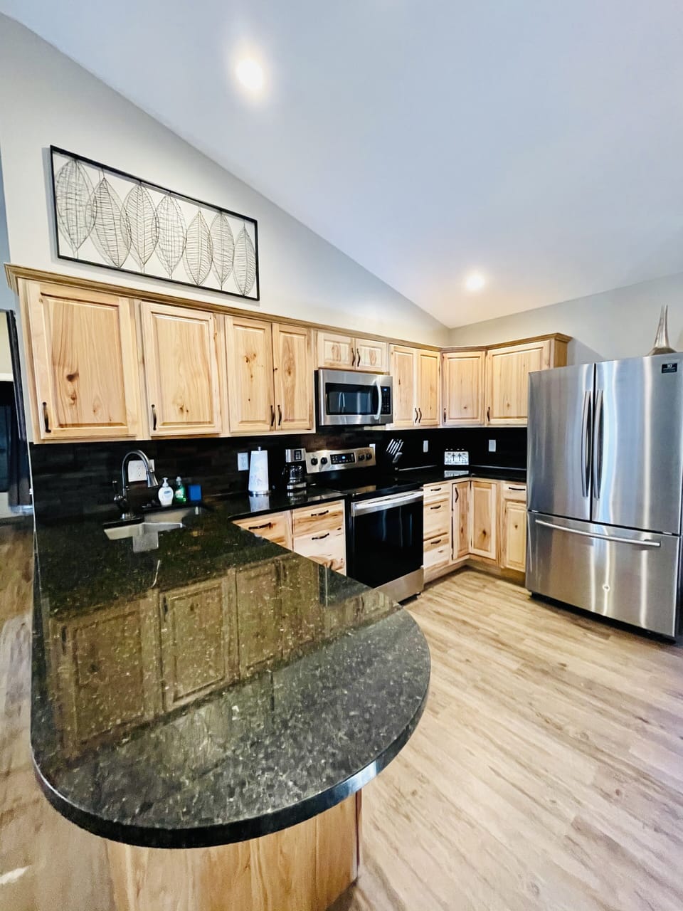 Kitchen with granite countertops.