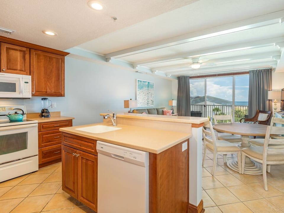 Fully Equipped kitchen with counter seating for 2