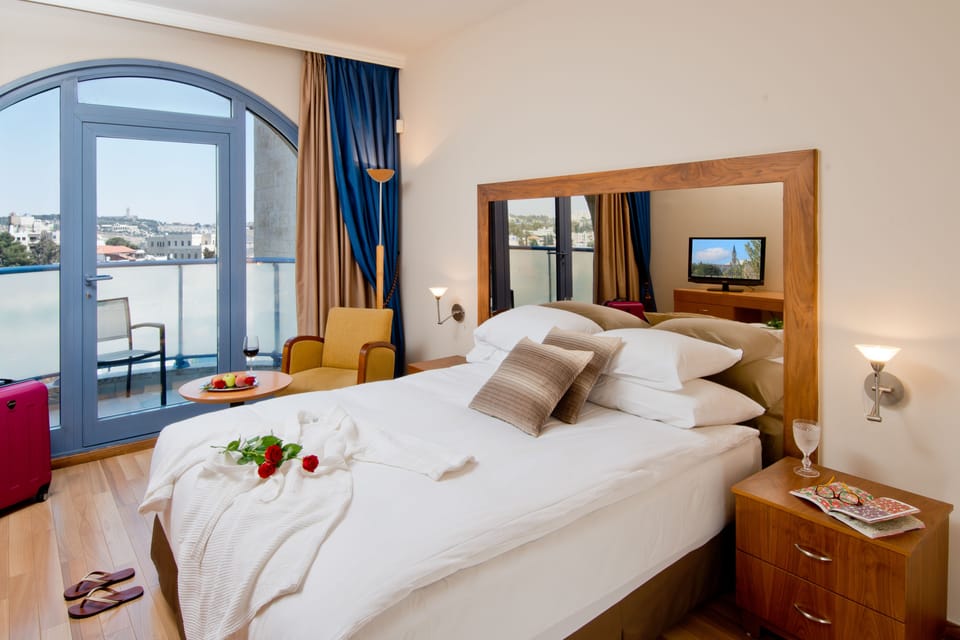 Superior Room with Balcony | Minibar, in-room safe, desk, soundproofing