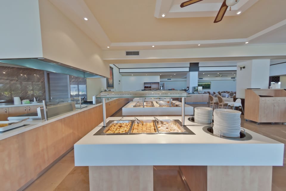 Breakfast, lunch, dinner served; pool views