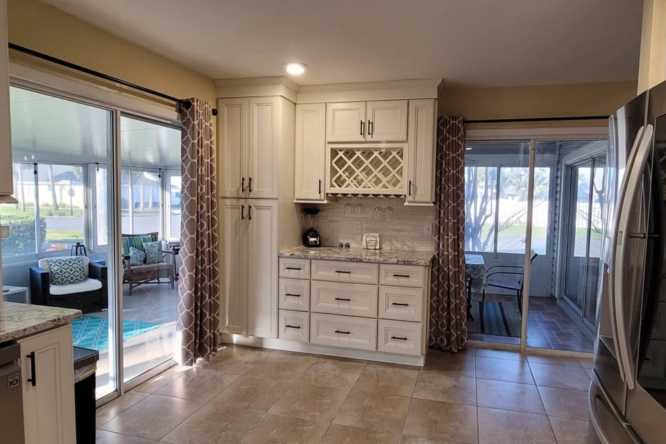 Newly Renovated Kitchen Leads Into The Outdoor Patio Area