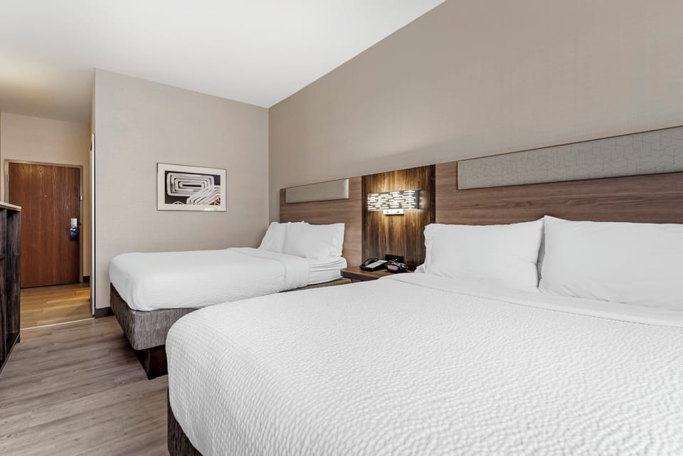 Hypo-allergenic bedding available, pillowtop beds, in-room safe, desk