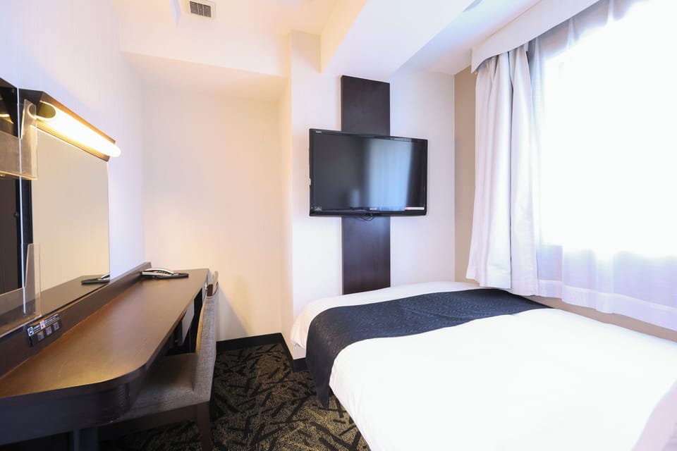 Down comforters, desk, blackout drapes, free WiFi