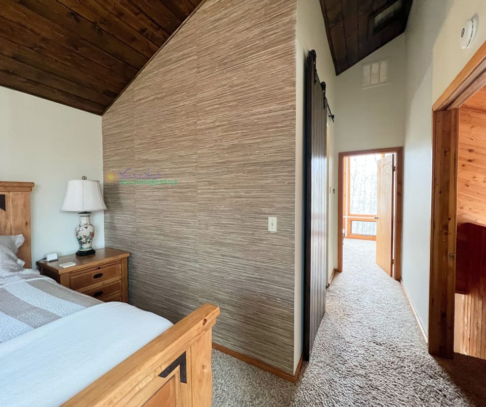 Upstairs bedroom with king bed. - Upstairs bedroom with king bed.
