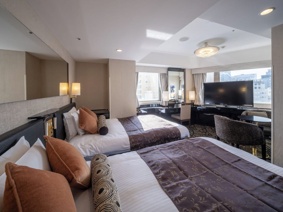Deluxe Twin Room, Non Smoking | Premium bedding, down comforters, desk, blackout drapes