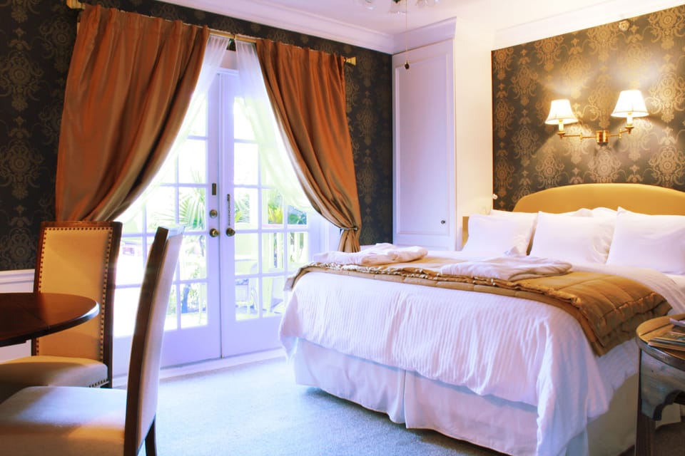 Premium bedding, down comforters, pillowtop beds, in-room safe