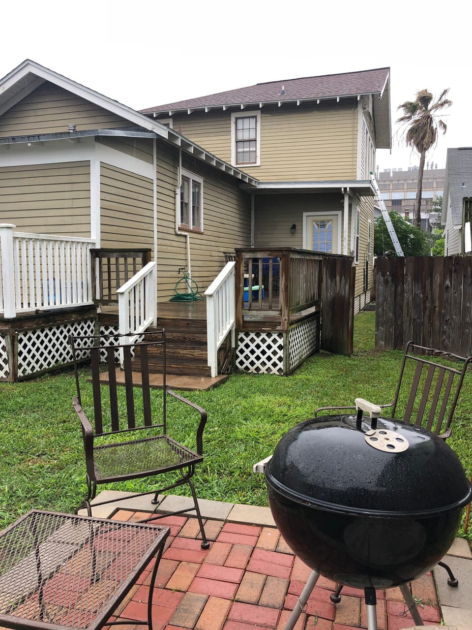 Charcoal BBQ back yard and porch