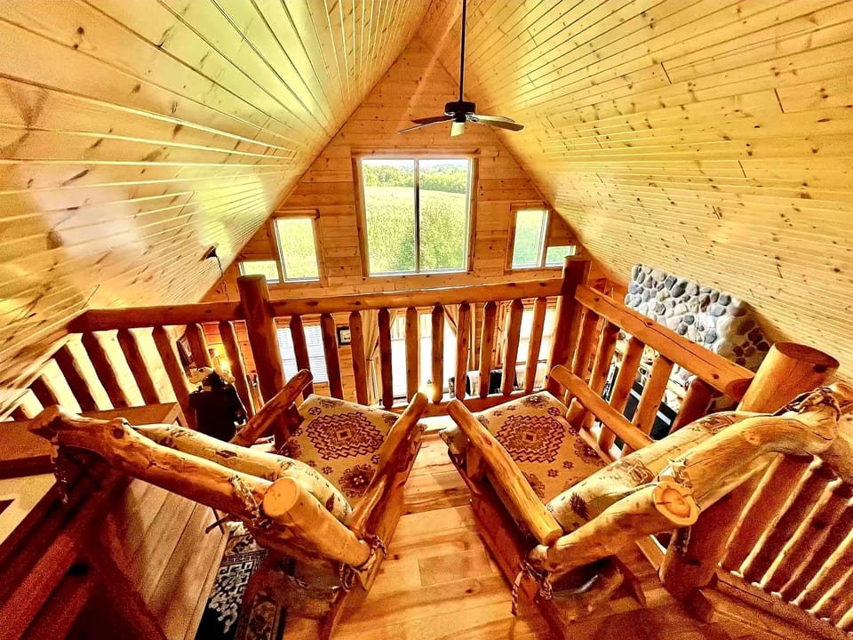 Log rocking chairs with a beautiful view!