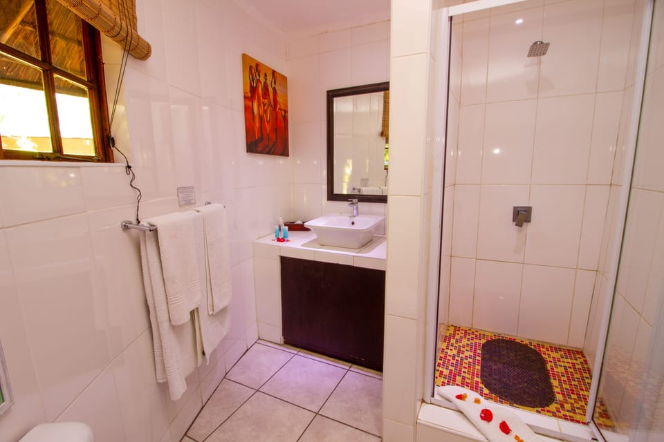 Family Room, 2 Bedrooms | Bathroom | Shower, free toiletries, hair dryer, towels