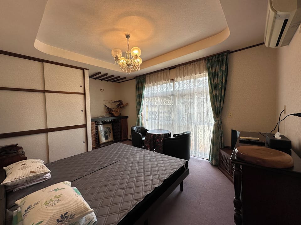 Premium bedding, down comforters, desk, laptop workspace