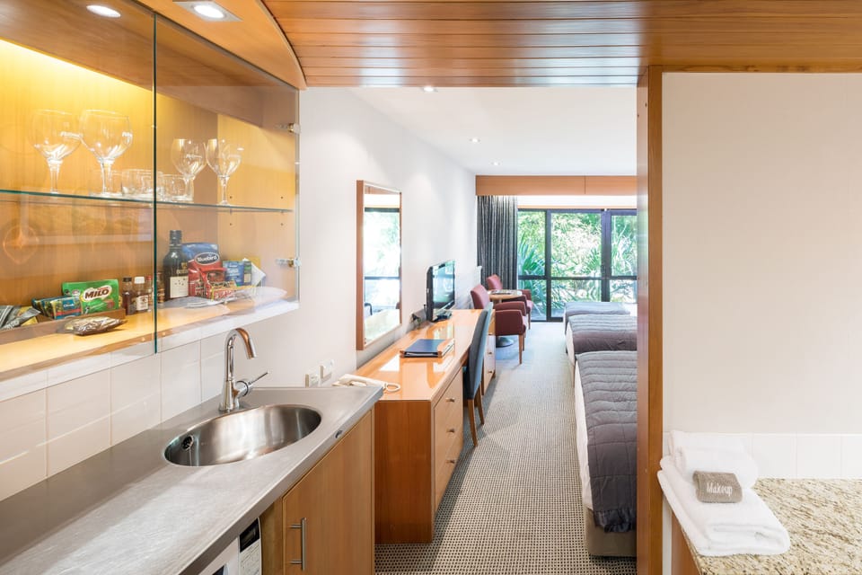 Premium Family Room (1 Queen and 2 Singles) | Private kitchen | Coffee/tea maker, fridge, microwave (on request)