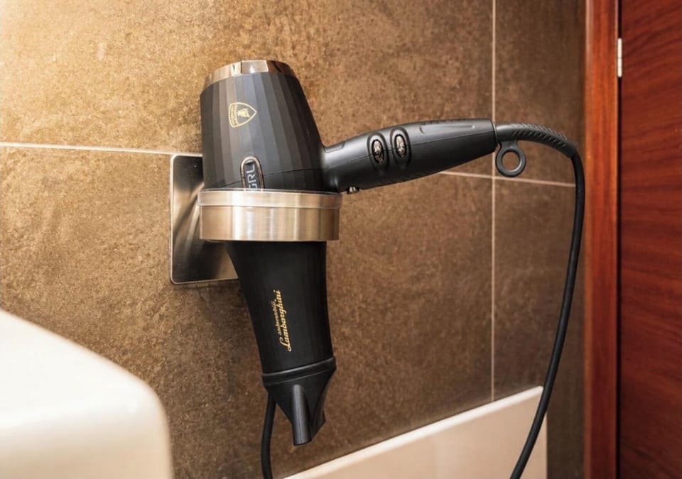 Deluxe Triple Room, 1 Bedroom | Bathroom amenities | Shower, free toiletries, hair dryer, bidet