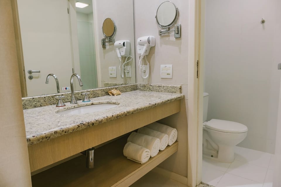 Shower, rainfall showerhead, free toiletries, hair dryer