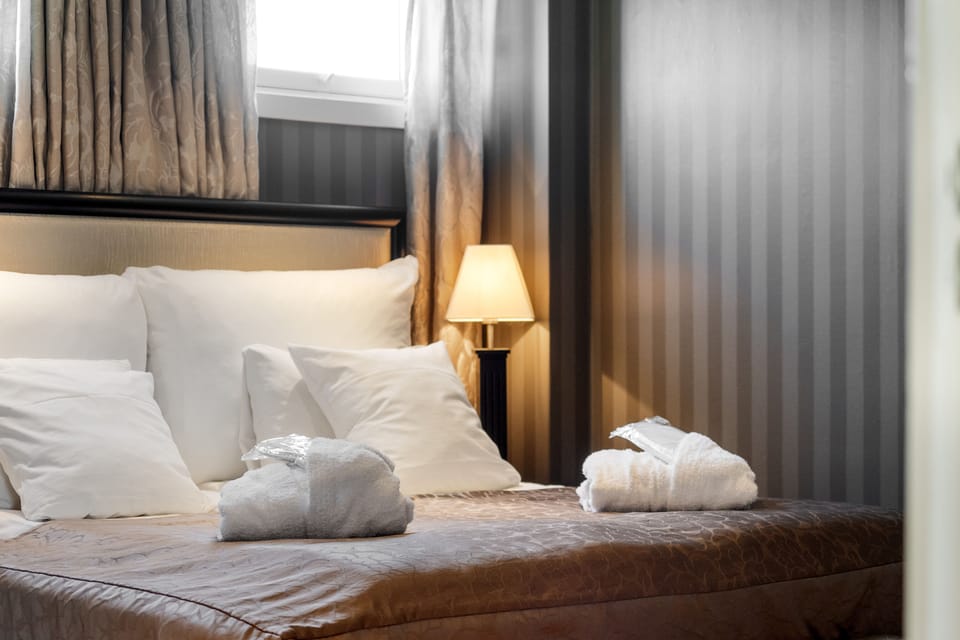 Deluxe Suite | Pillowtop beds, desk, laptop workspace, free WiFi