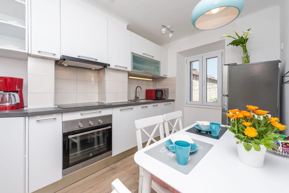 Apartment (2 Bedroom Apartment with City View) | Private kitchen | Fridge