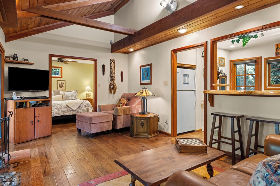Warm wood accents and timeless cabin character create an inviting retreat.