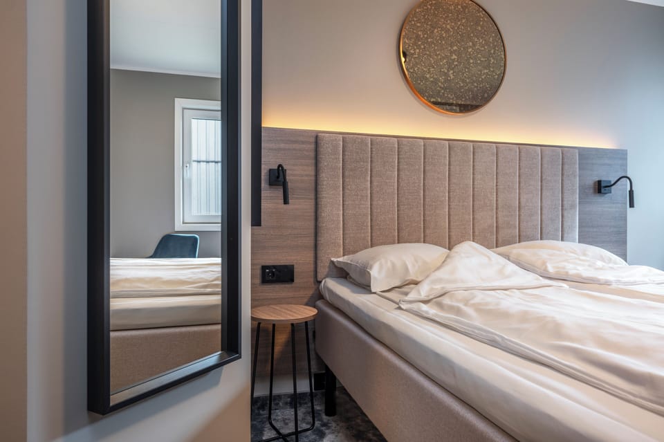 Desk, laptop workspace, free WiFi, bed sheets