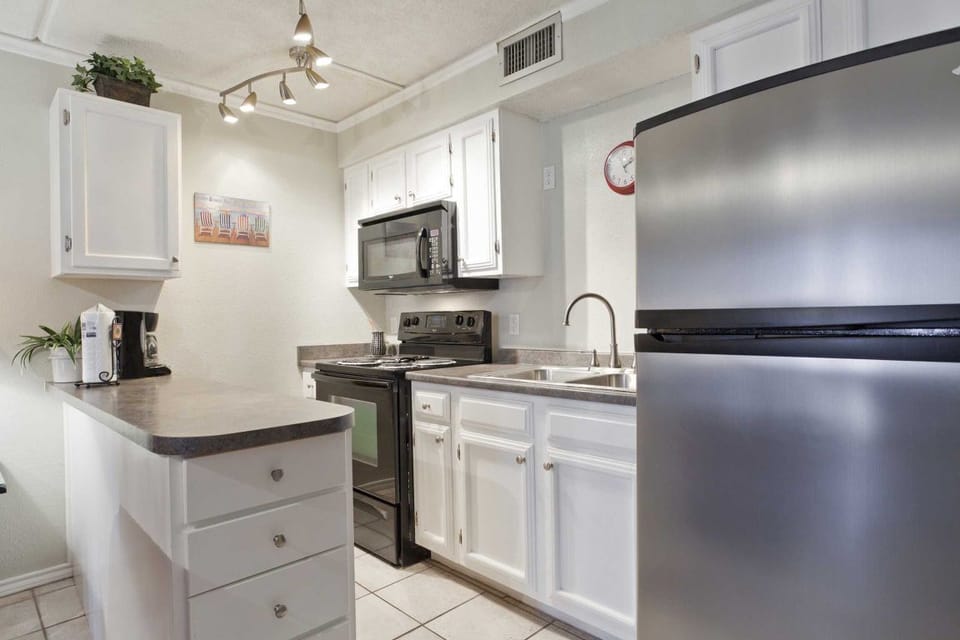 Our cute little kitchen packs a big punch with full-size appliances! Whip up a seafood feast while you're here!