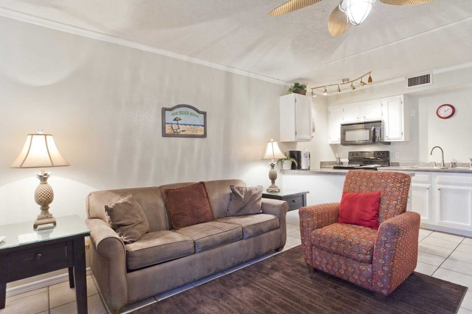 Our cozy little corner of paradise feels grand thanks to our open floor plan and sunny windows.