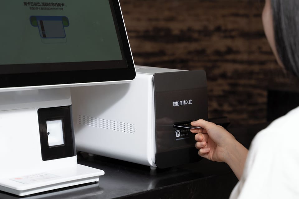 Check-in/check-out kiosk