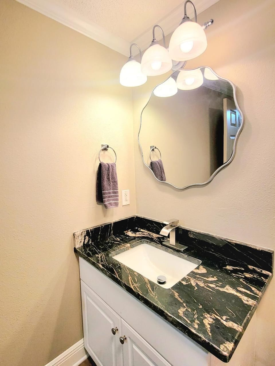 Master bath with granite and walk in shower.