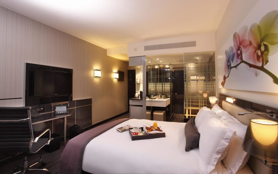 Down comforters, pillowtop beds, minibar, in-room safe