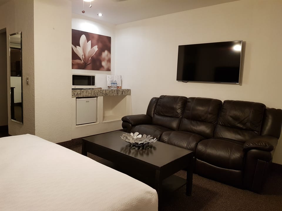 Premium Suite, Multiple Beds | Premium bedding, in-room safe, desk, blackout drapes
