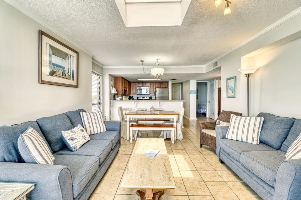 View of living room, dining and kitchen areas 
