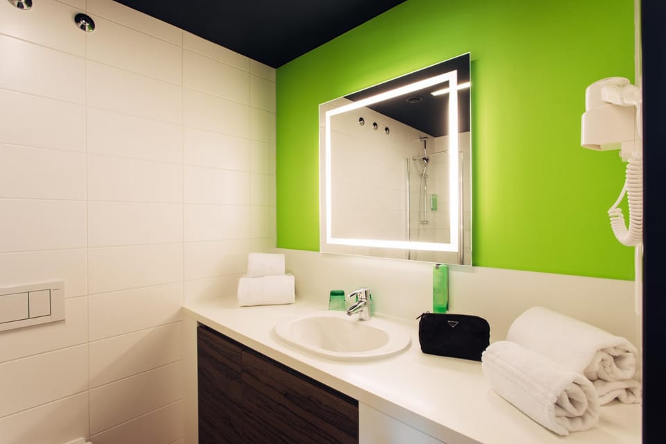 Eco-friendly toiletries, hair dryer, towels, soap