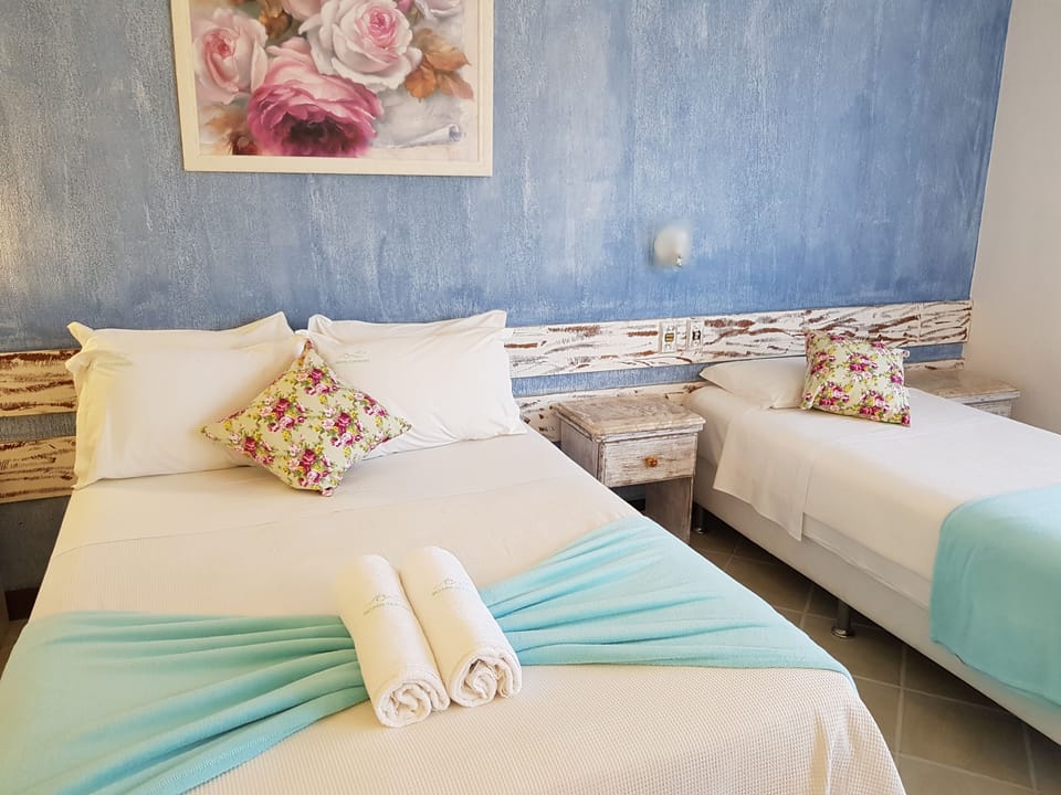 Standard Triple Room, Sea View | In-room safe, desk, free cribs/infant beds, free WiFi