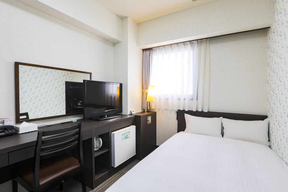 Desk, blackout drapes, iron/ironing board, free WiFi